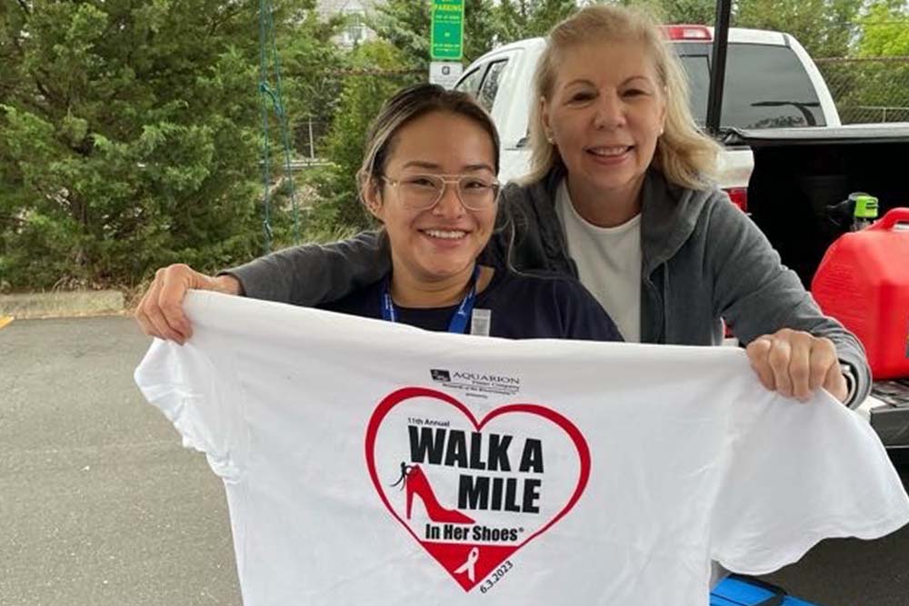 community members rallying at walk to raise awareness