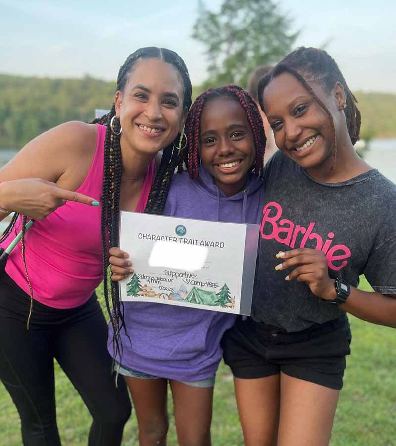 happy camper received character award at camp hope